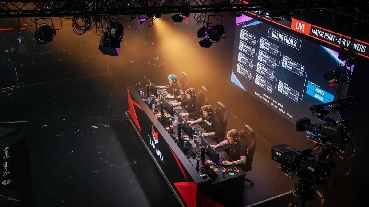 Tournament stage with a single team booth under dramatic lighting
